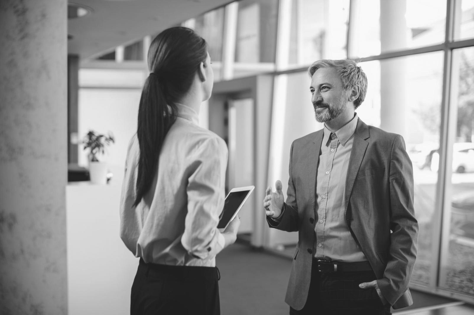 Close-up of hands working with financial spreadsheets and budget calculations
